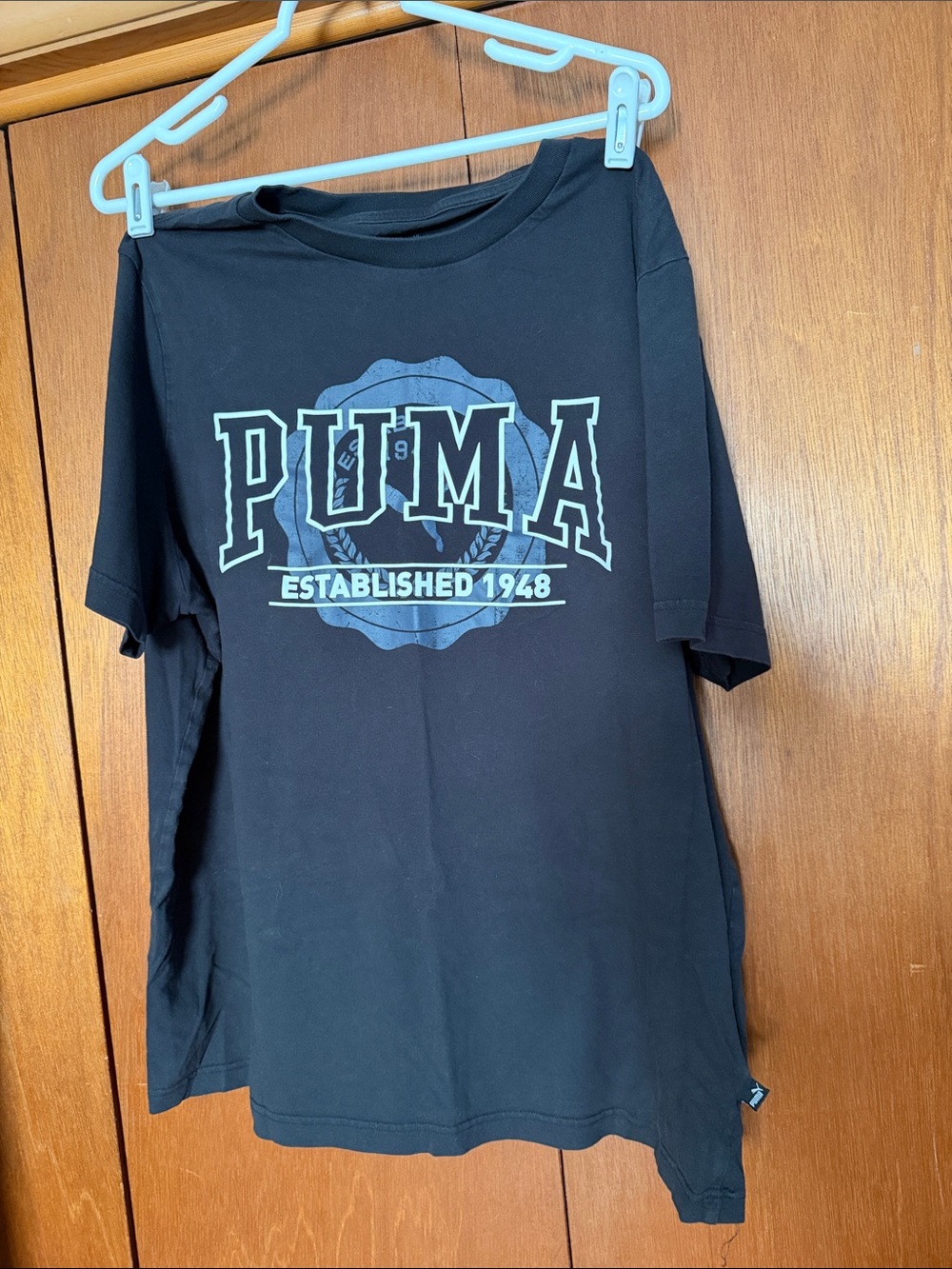 Puma Black Short-Sleeve Tee with Light Blue Logo